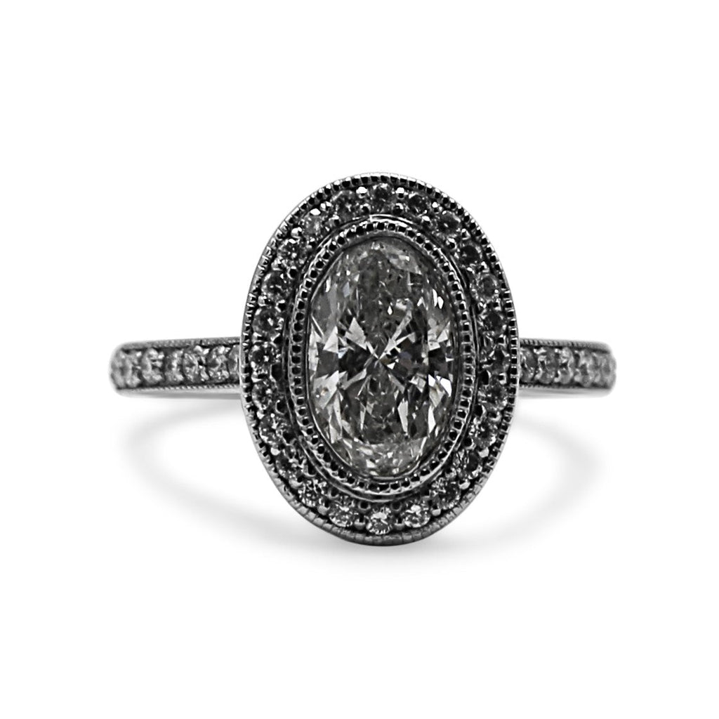 used Oval Brilliant Solitaire Halo Set Diamond Ring