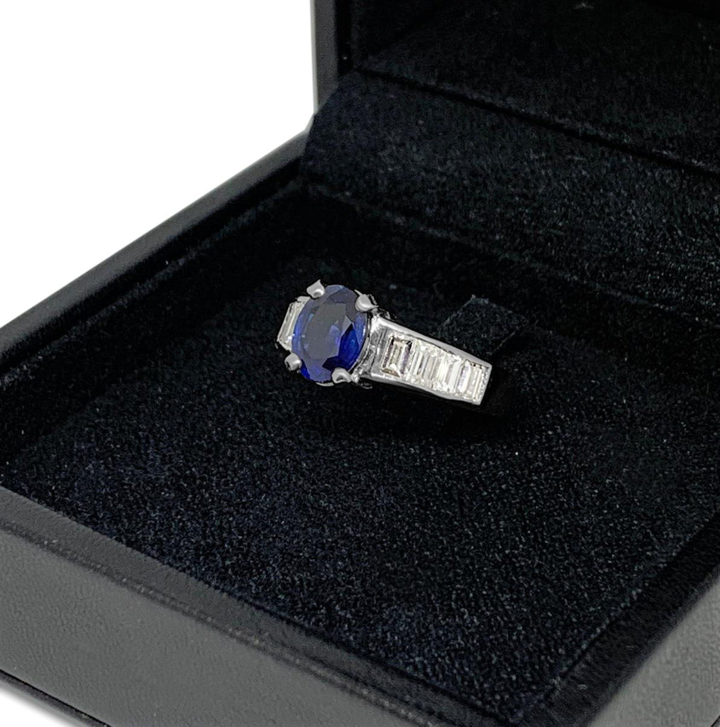 used Platinum Solitaire Oval Sapphire Ring With Baguette Diamond Shoulders